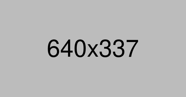 Seagulls Flying Against Blue Sky